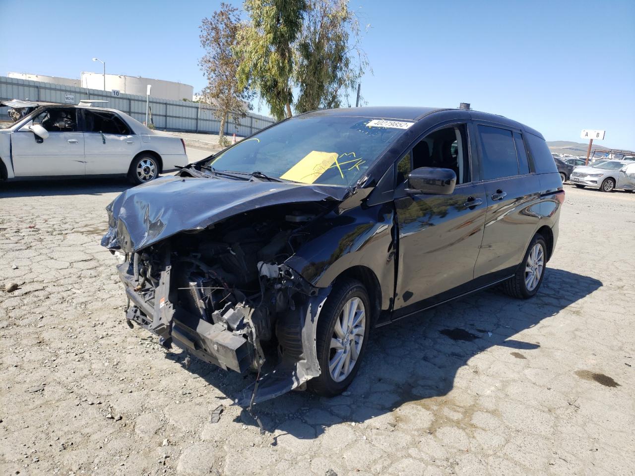 Photo 2 from auction – 2012 MAZDA 5 with VIN JM1CW2BL1C0117590