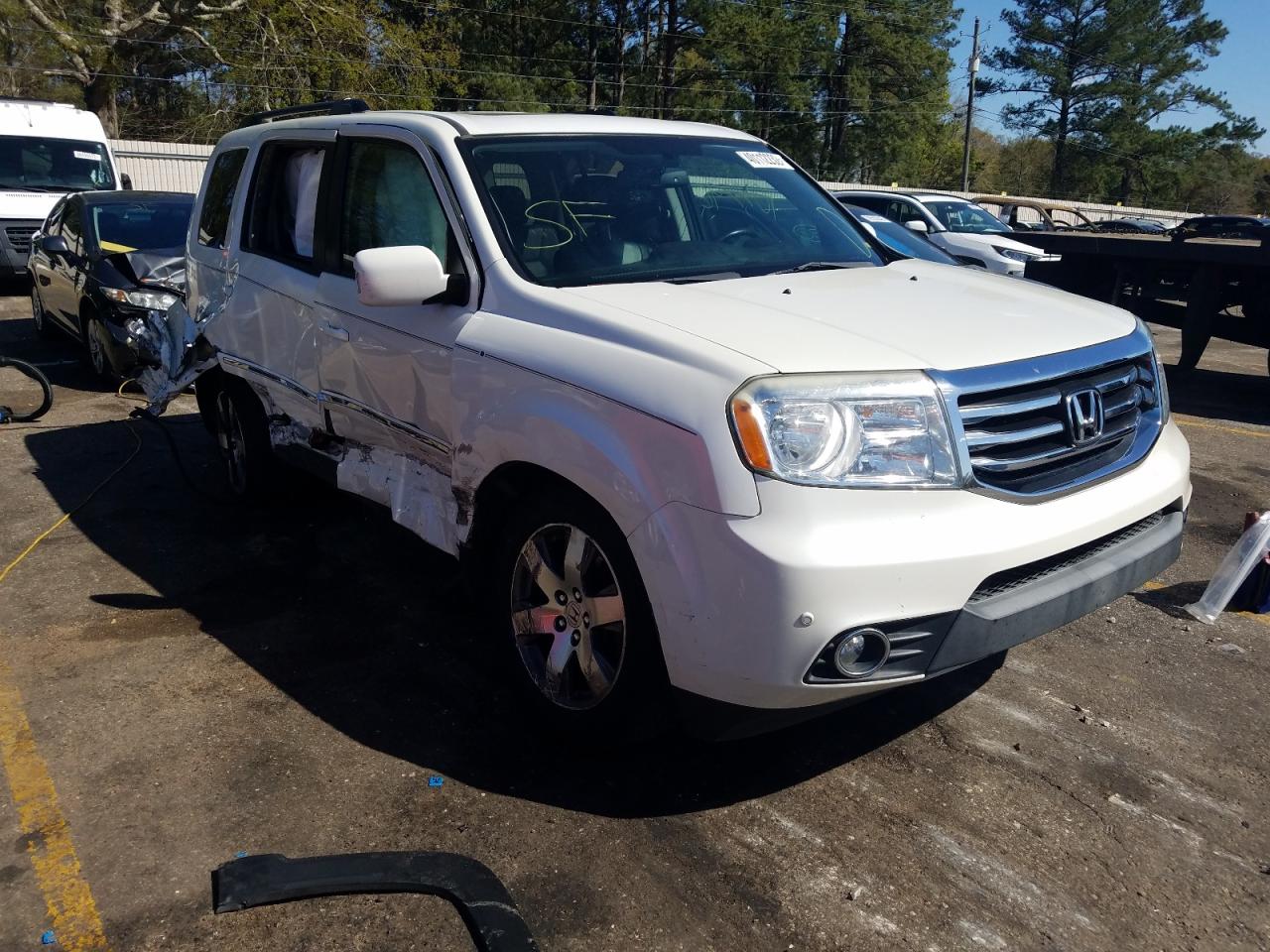 HONDA PILOT TOUR 2014 with VIN 5FNYF3H98EB012475 - Photo from auction