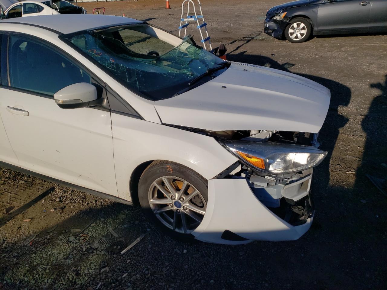 Photo 9 from auction – 2016 FORD FOCUS SE with VIN 1FADP3F20GL285370