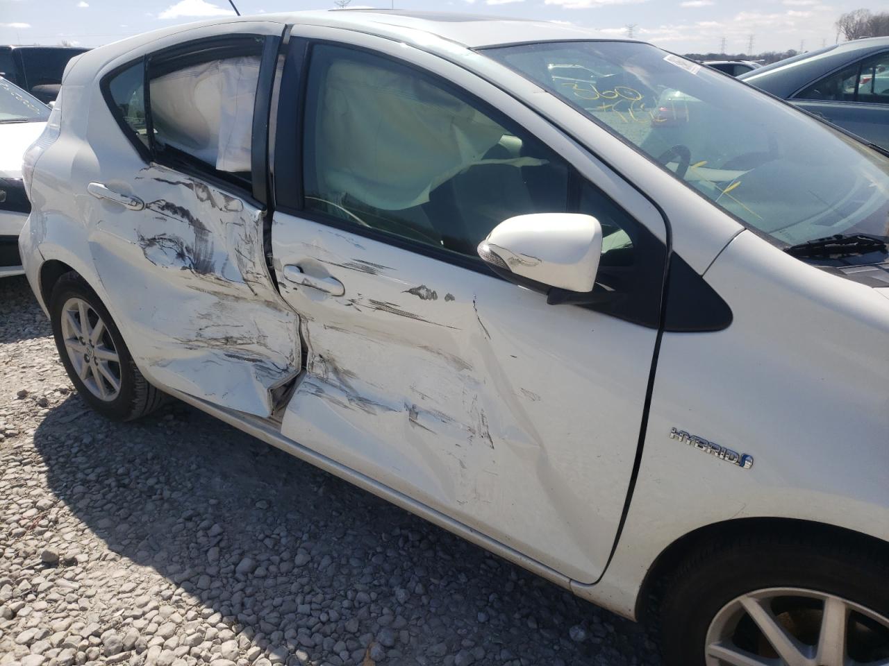 Photo 9 from auction – 2012 TOYOTA PRIUS C with VIN JTDKDTB3XC1022706