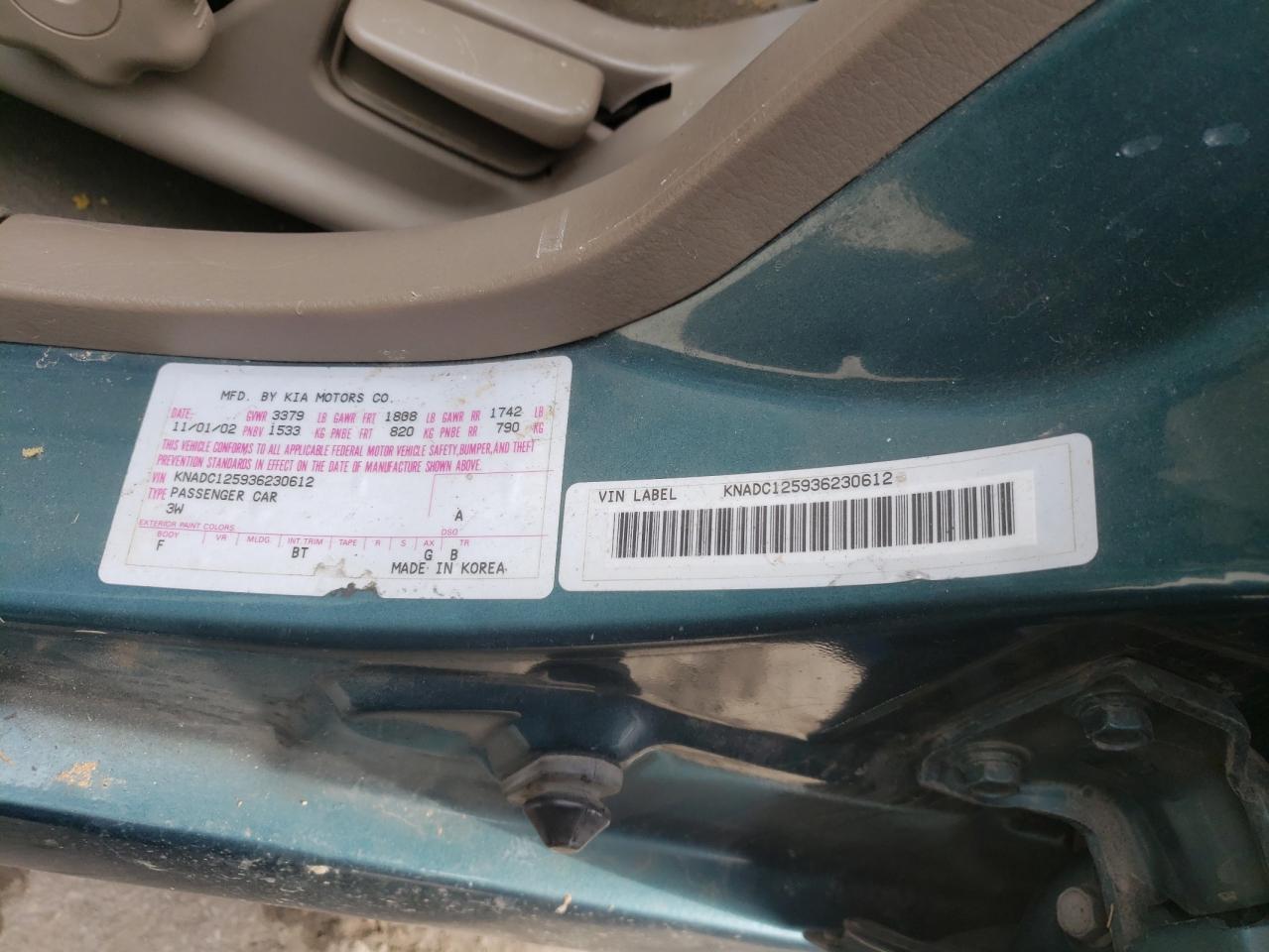 Photo 10 from auction – 2003 KIA RIO with VIN KNADC125936230612