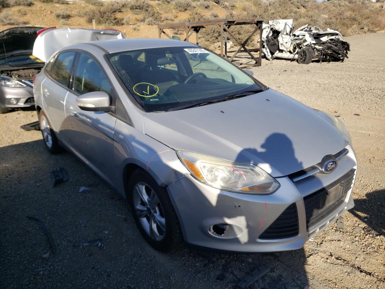 FORD FOCUS SE 2014 with VIN 1FADP3F20EL248770 - Photo from auction
