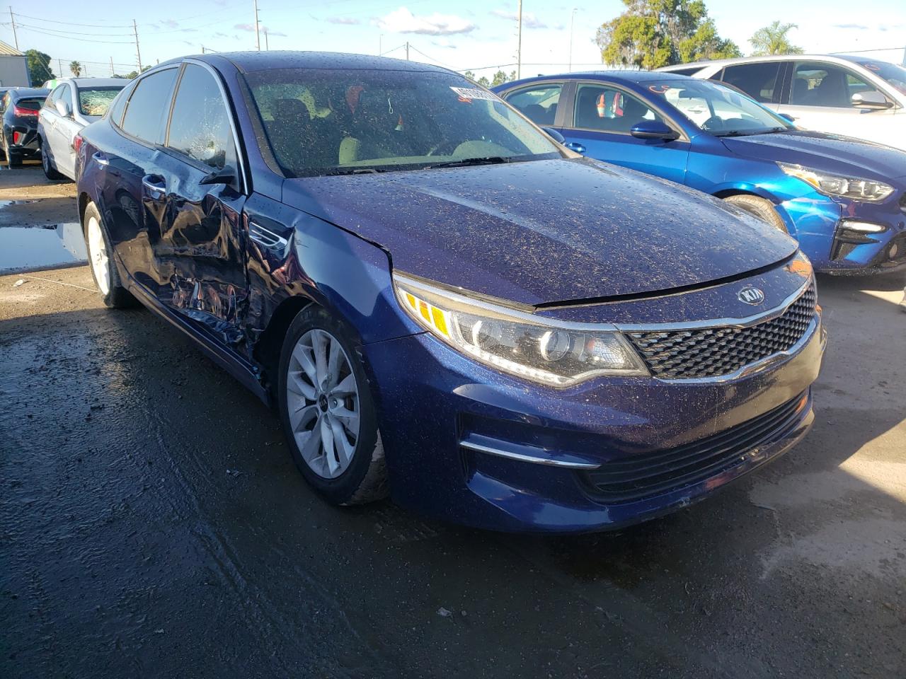 KIA OPTIMA EX 2016 with VIN 5XXGU4L39GG014486 - Photo from auction