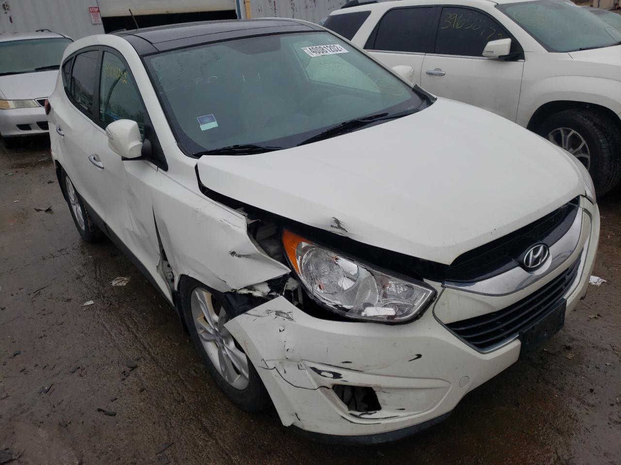 HYUNDAI TUCSON GLS 2011 with VIN KM8JUCAC8BU228015 - Photo from auction