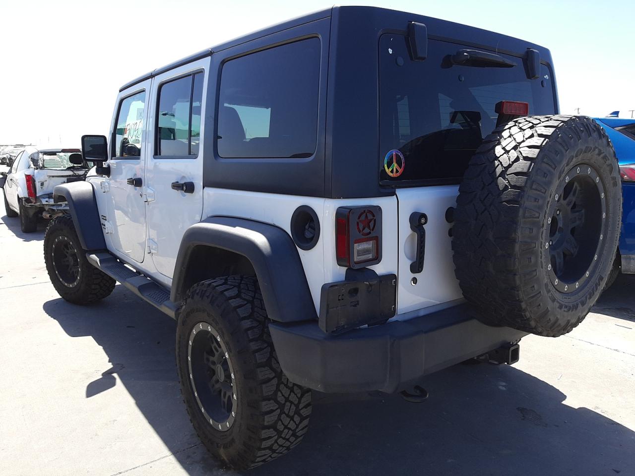 Photo 3 from auction – 2014 JEEP WRANGLER U with VIN 1C4BJWDG9EL251069