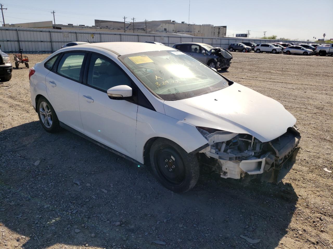 FORD FOCUS SE 2014 with VIN 1FADP3F24EL451404 - Photo from auction