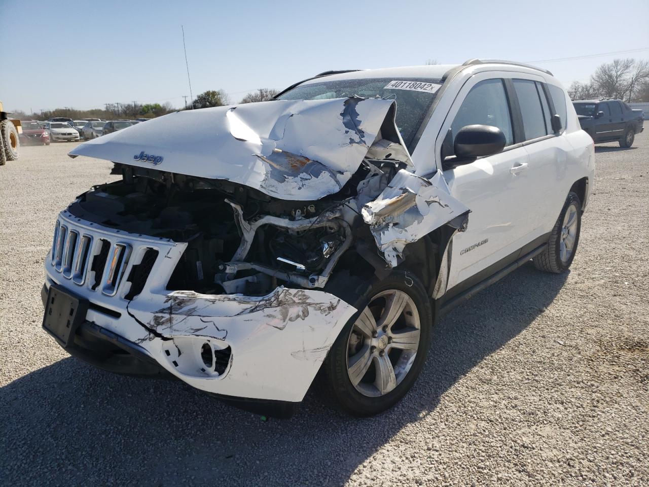 Photo 9 from auction – 2011 JEEP COMPASS SP with VIN 1J4NT1FB7BD192096