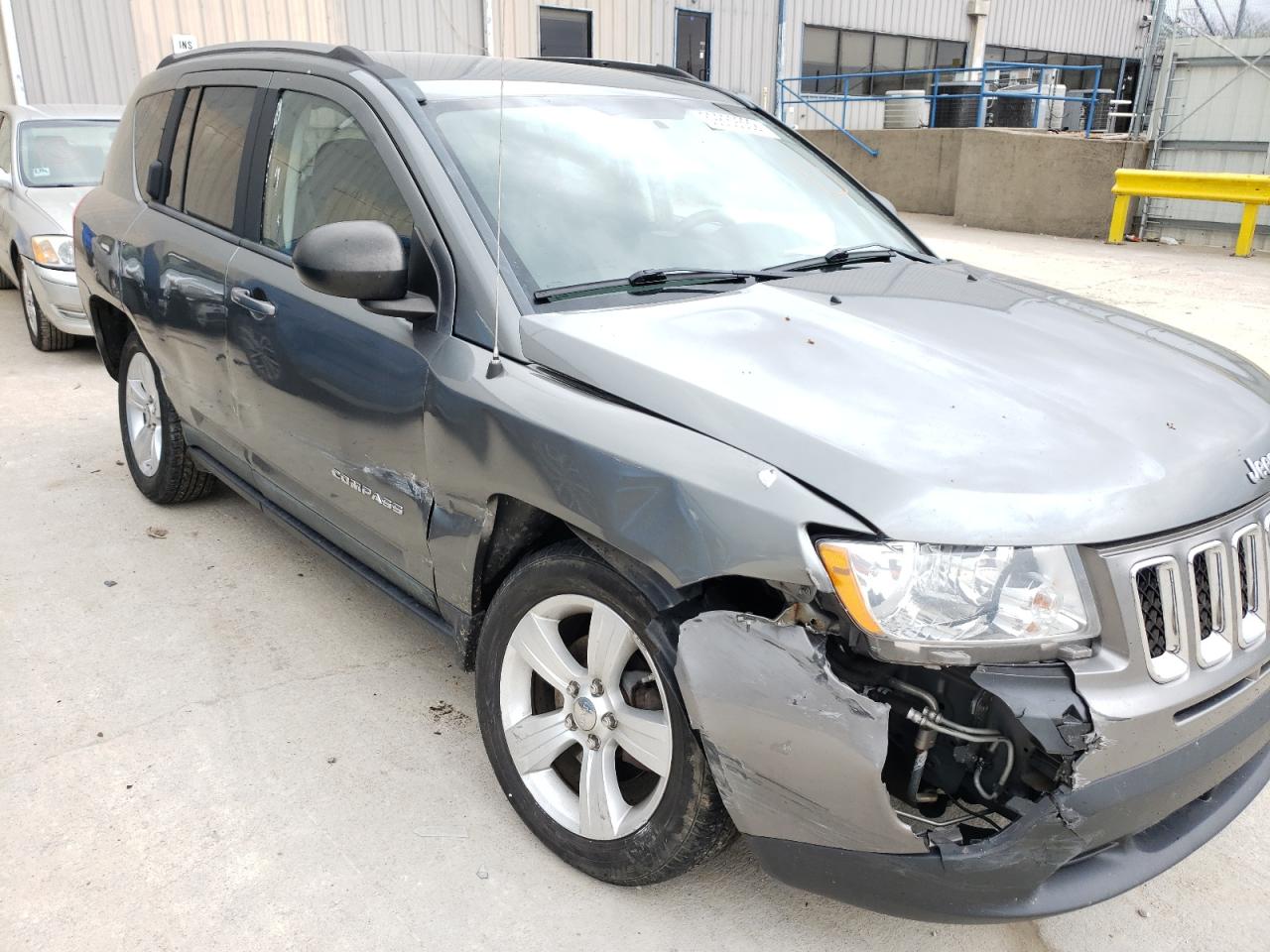 Photo 9 from auction – 2011 JEEP COMPASS SP with VIN 1J4NT1FA4BD285813