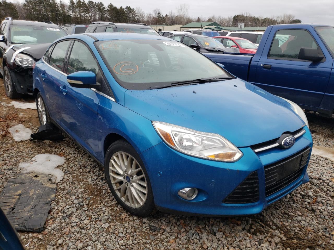 FORD FOCUS SEL 2012 with VIN 1FAHP3H2XCL249033 - Photo from auction