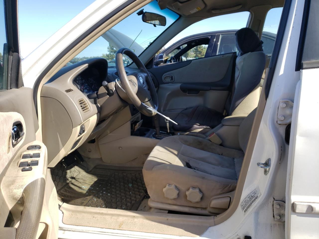 Photo 5 from auction – 2003 MAZDA PROTEGE DX with VIN JM1BJ225230200201
