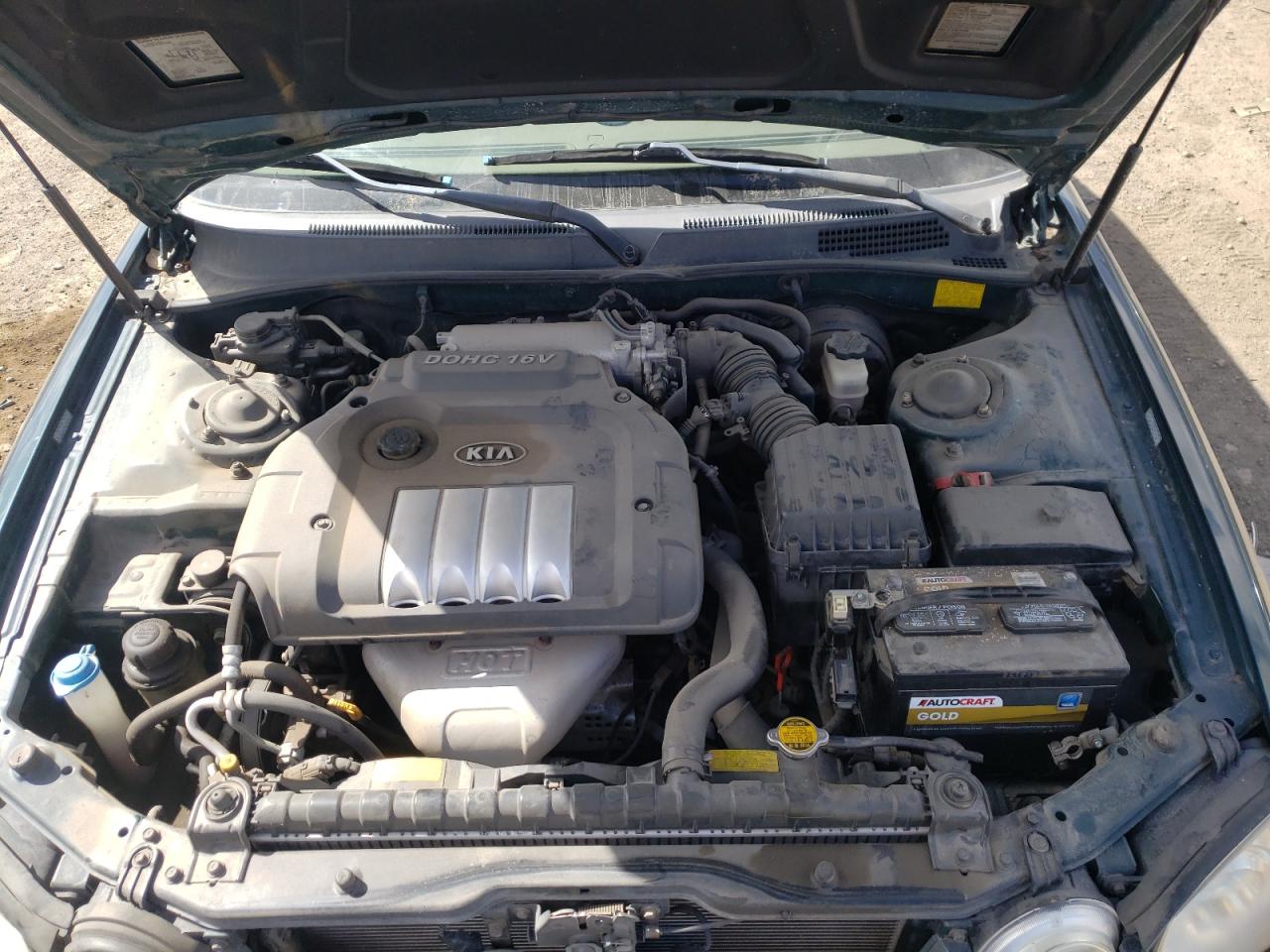 Photo 7 from auction – 2004 KIA OPTIMA LX with VIN KNAGD126145314529