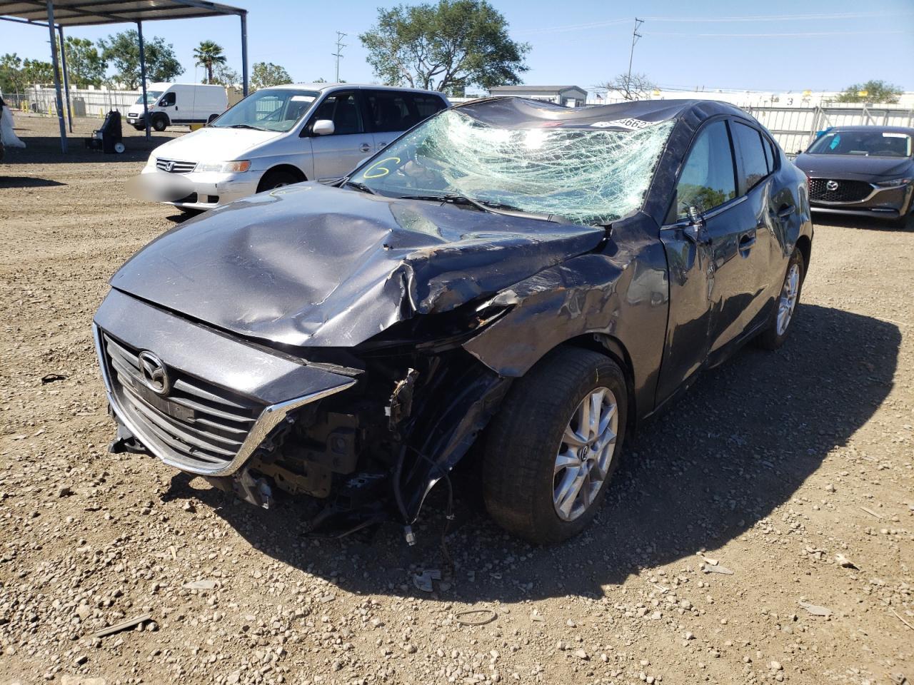 Photo 2 from auction – 2015 MAZDA 3 TOURING with VIN JM1BM1V72F1244003
