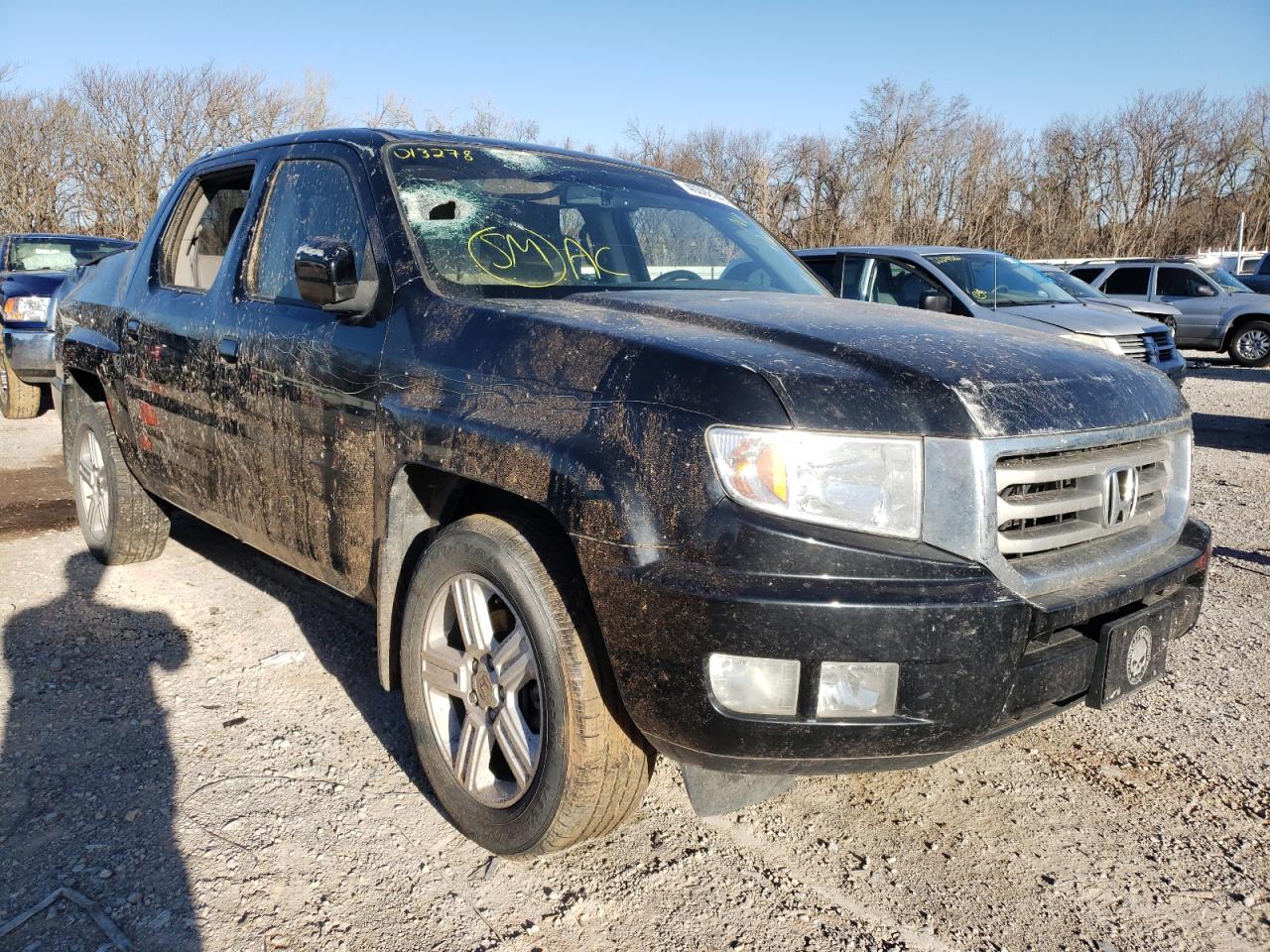 HONDA RIDGELINE 2013 with VIN 5FPYK1F53DB013278 - Photo from auction