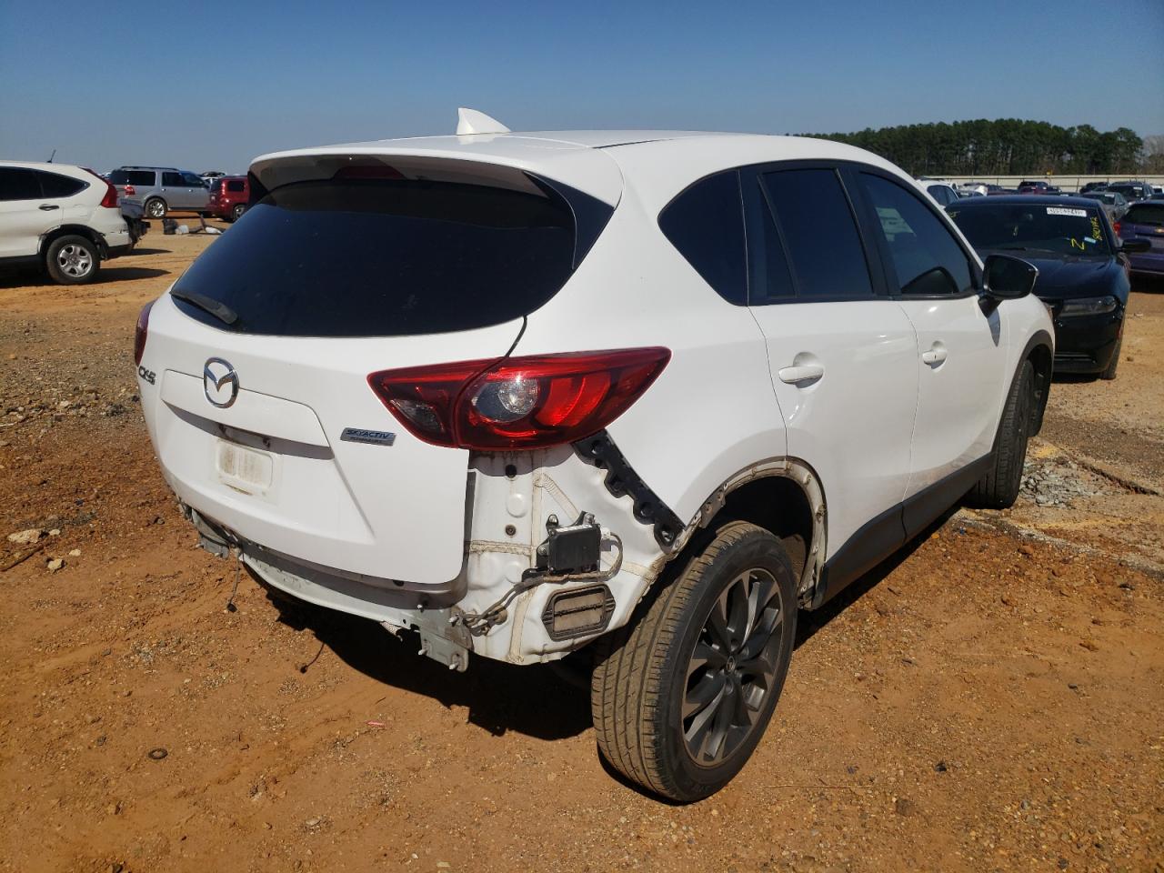 Photo 4 from auction – 2016 MAZDA CX-5 GT with VIN JM3KE2DY8G0865158