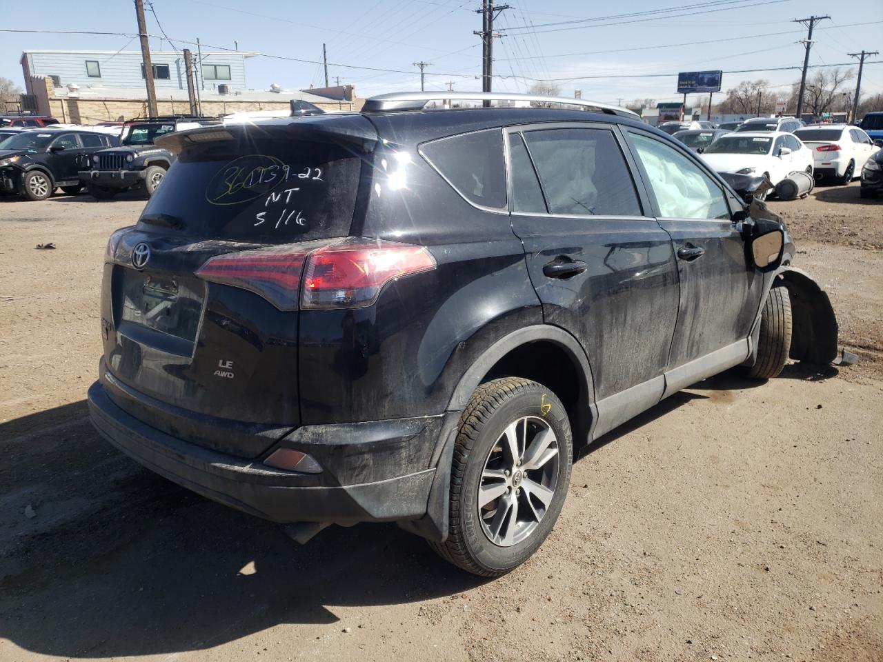 Photo 4 from auction – 2018 TOYOTA RAV4 LE with VIN 2T3BFREV6JW720397