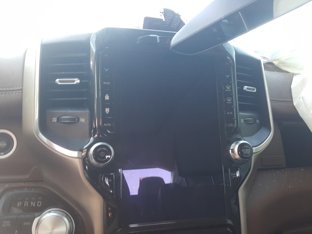 Photo 9 from auction – 2021 RAM 1500 LARAM with VIN 1C6SRFJT8MN636482