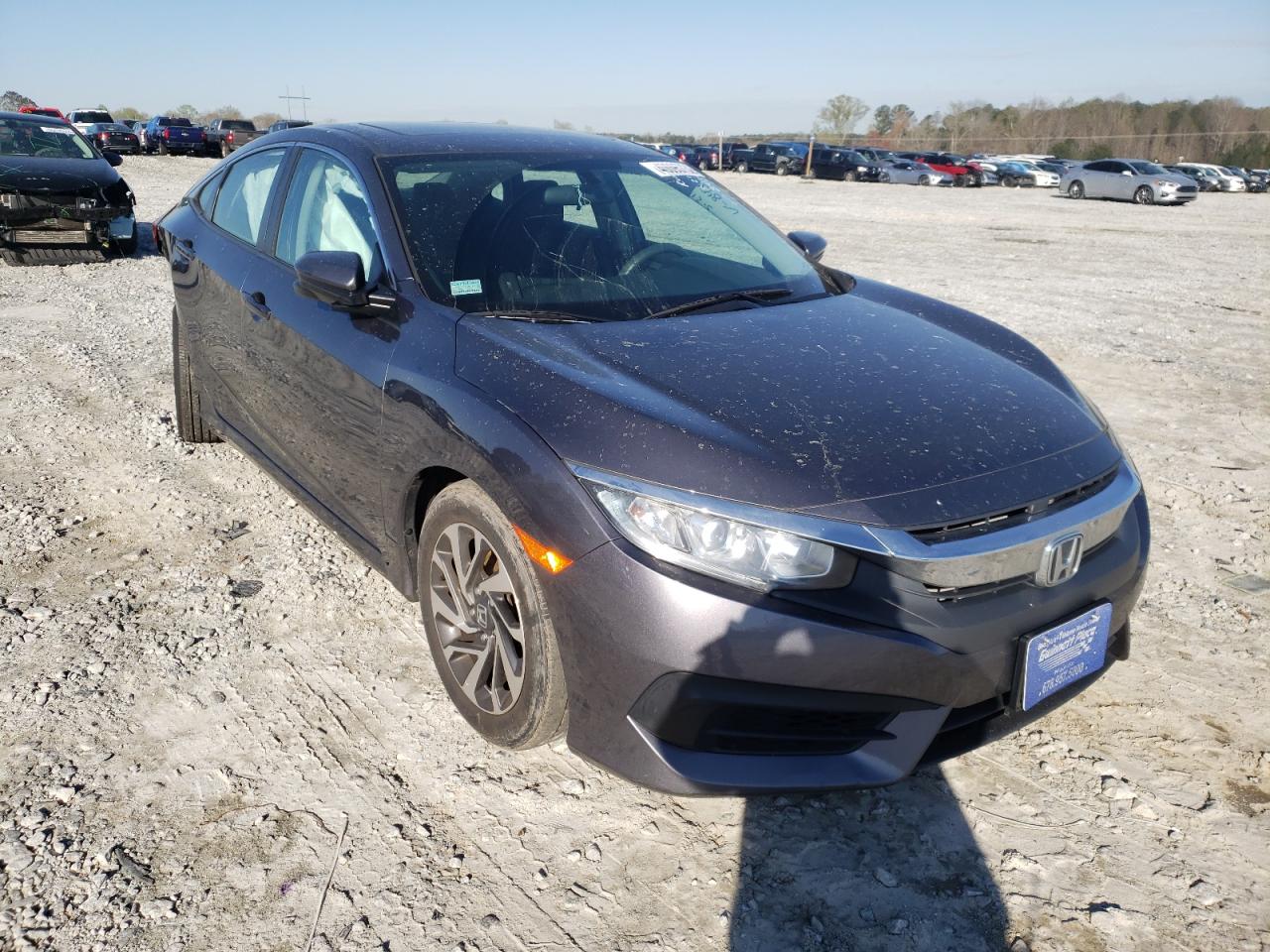 HONDA CIVIC EX 2016 with VIN 19XFC2F70GE238434 - Photo from auction