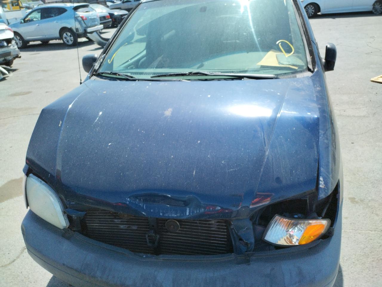 Photo 7 from auction – 2002 TOYOTA SIENNA with VIN 4T3ZF13C52U499250