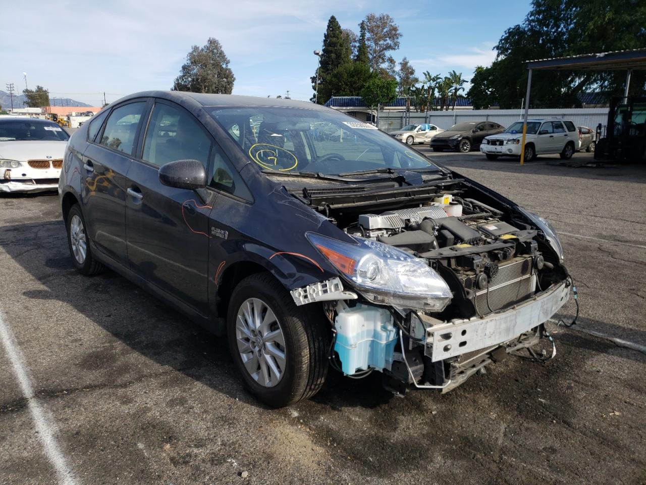 TOYOTA PRIUS PLUG 2014 with VIN JTDKN3DP0E3060532 - Photo from auction