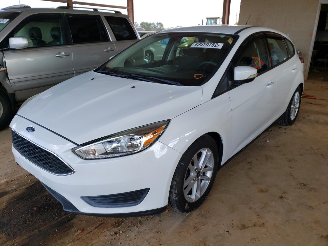 Photo 2 from auction – 2016 FORD FOCUS SE with VIN 1FADP3K23GL273767