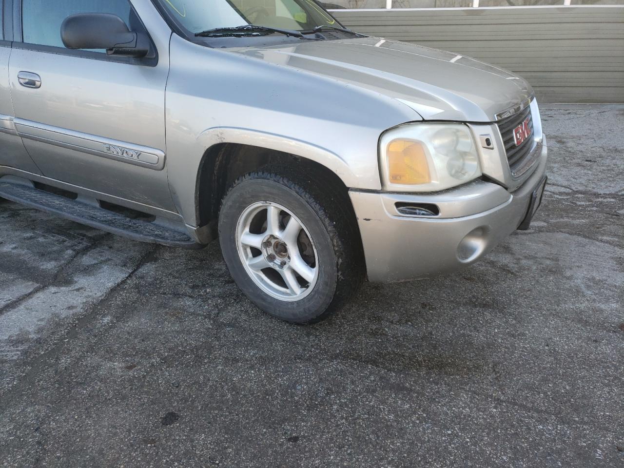 Photo 9 from auction – 2002 GMC ENVOY with VIN 1GKDT13S722509302