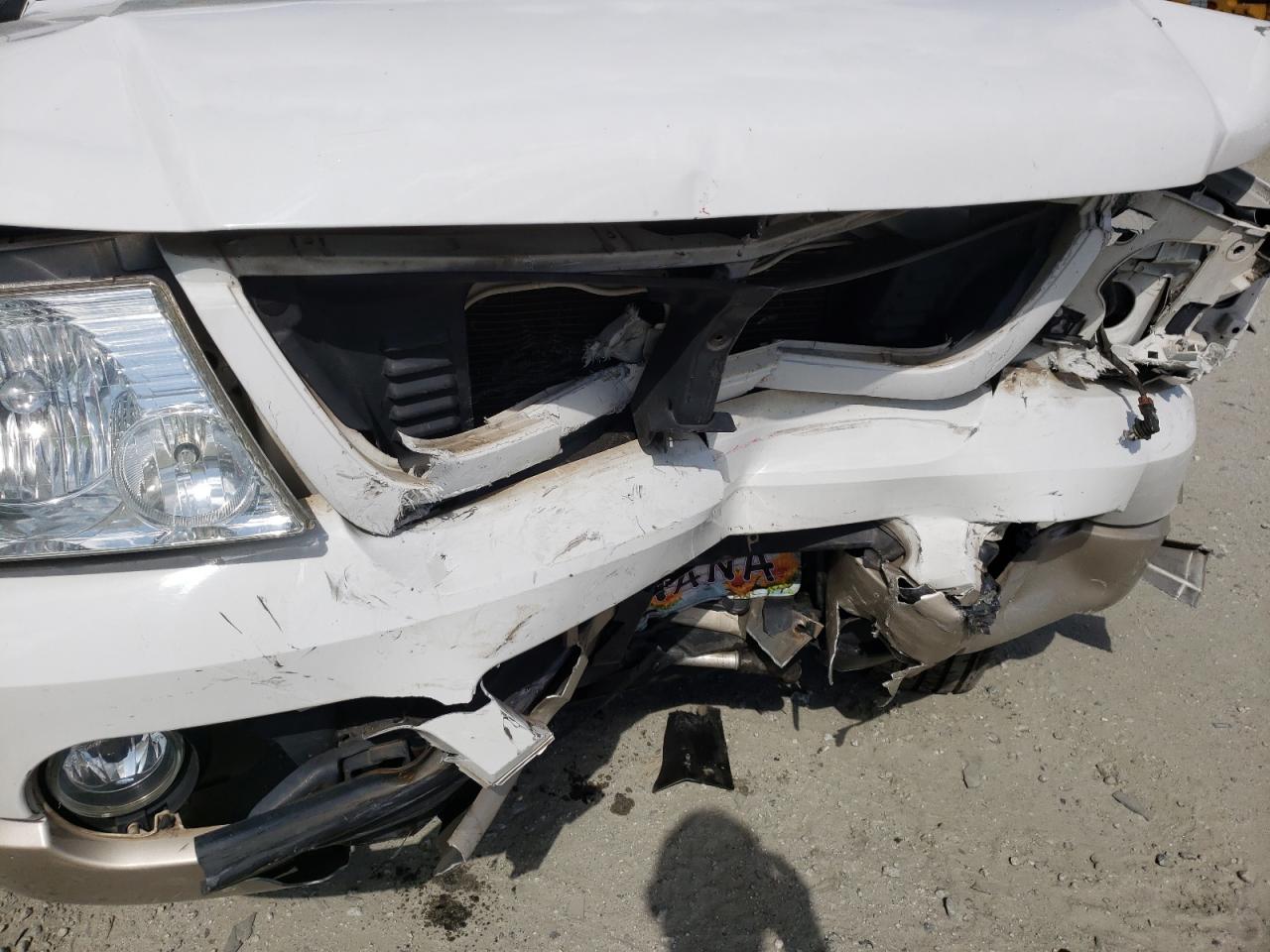 Photo 9 from auction – 2005 FORD EXPLORER E with VIN 1FMDU74K25UA06193