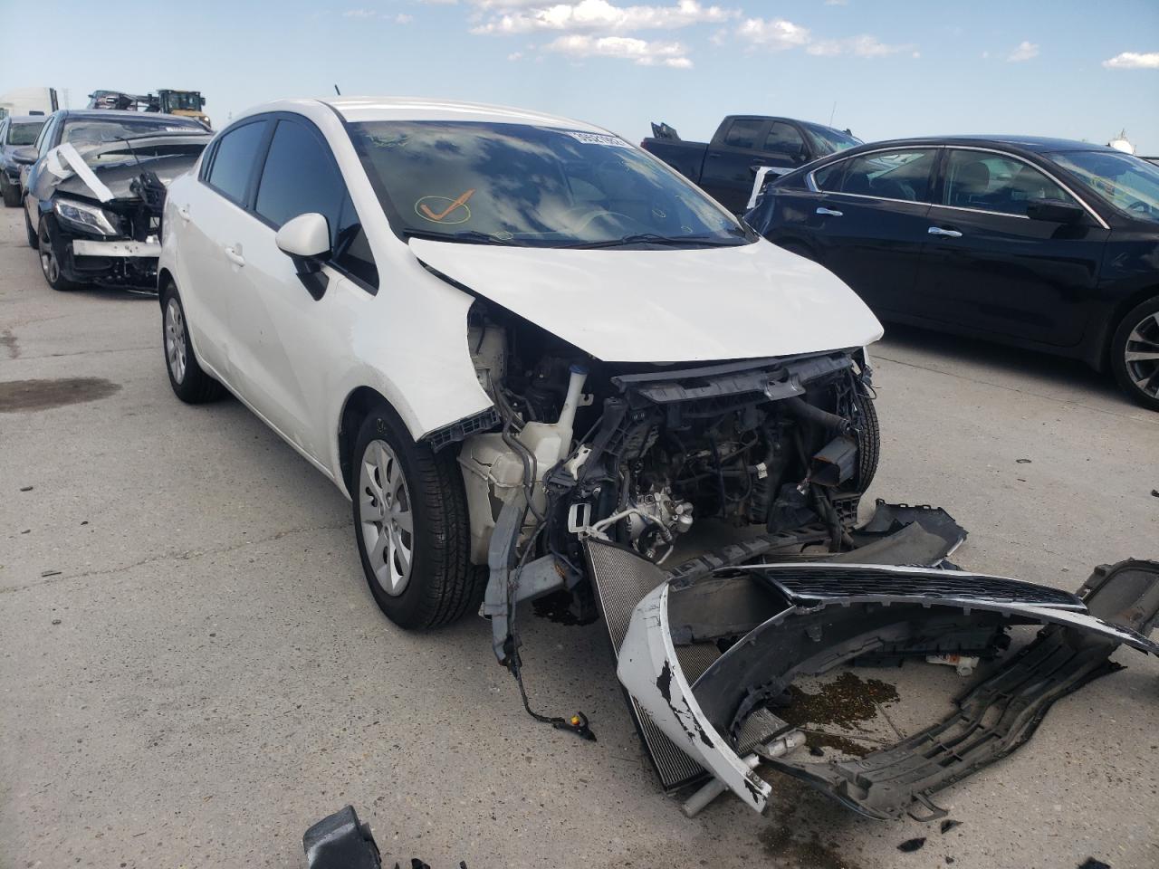 KIA RIO LX 2014 with VIN KNADM4A35E6385949 - Photo from auction