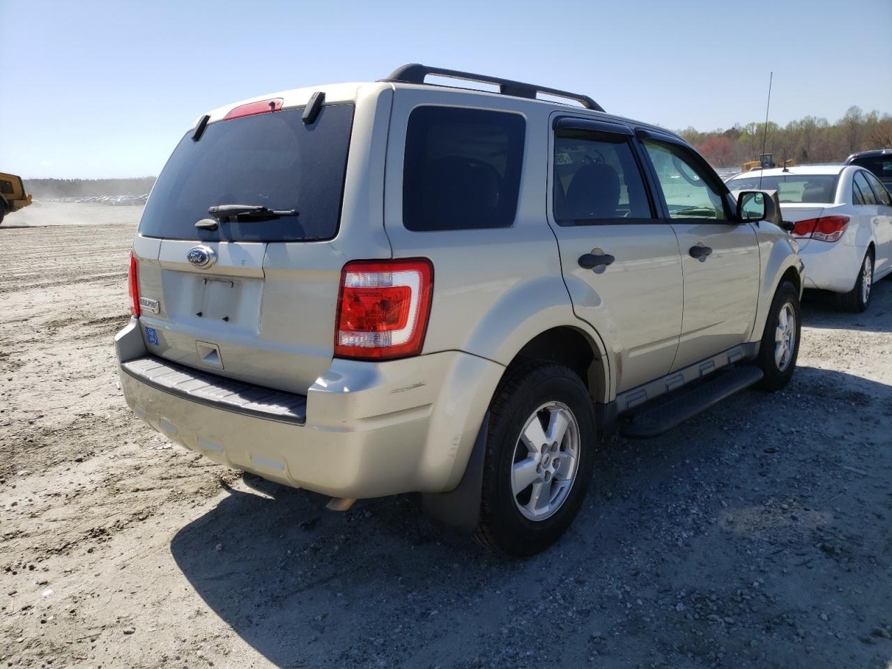 Photo 4 from auction – 2011 FORD ESCAPE with VIN 1FMCU0D79BKC47741