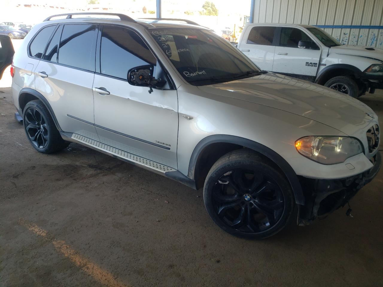BMW X5 XDRIVE5 2012 with VIN 5UXZV8C50CL423516 - Photo from auction