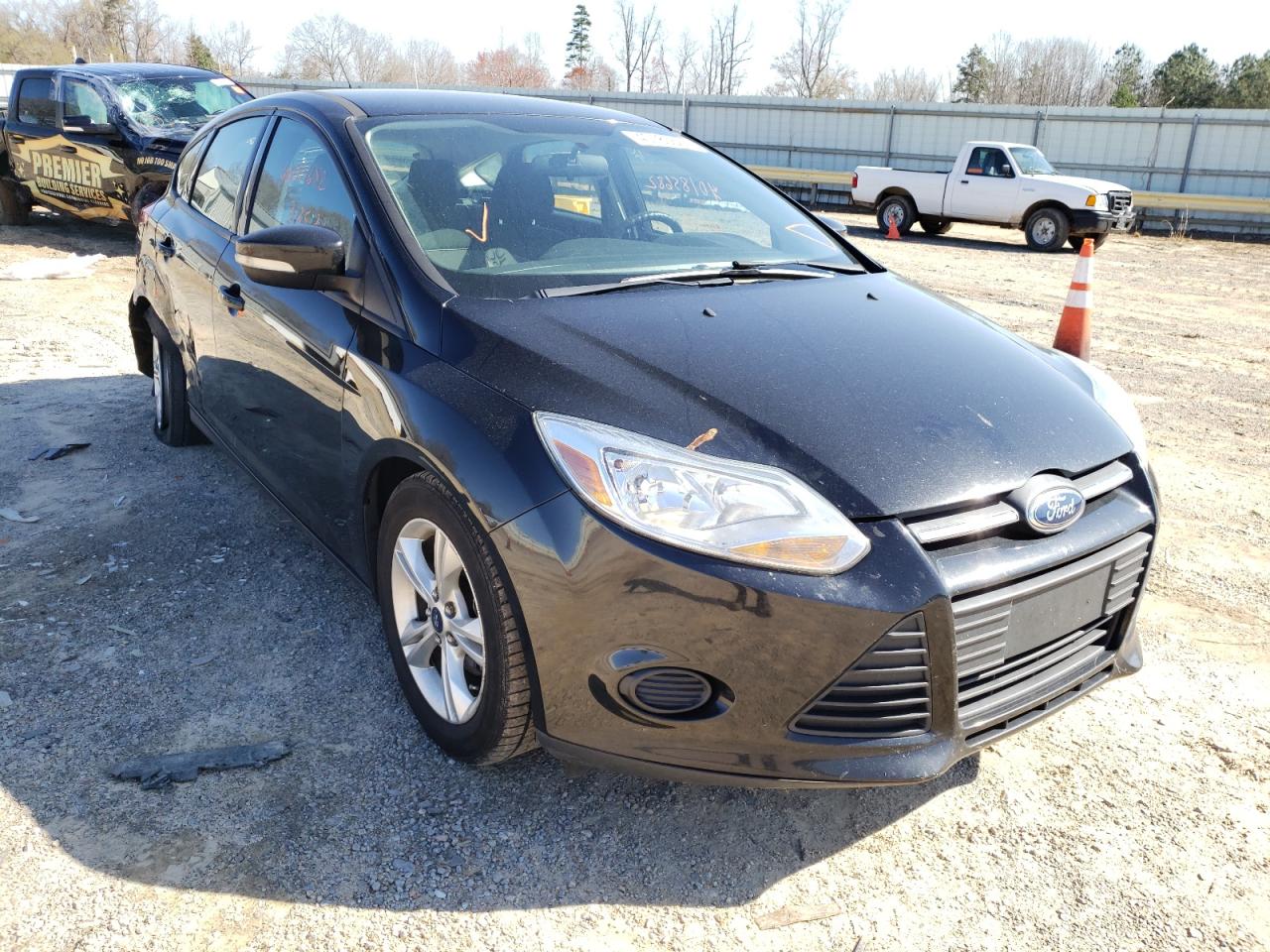 FORD FOCUS SE 2014 with VIN 1FADP3K26EL277874 - Photo from auction