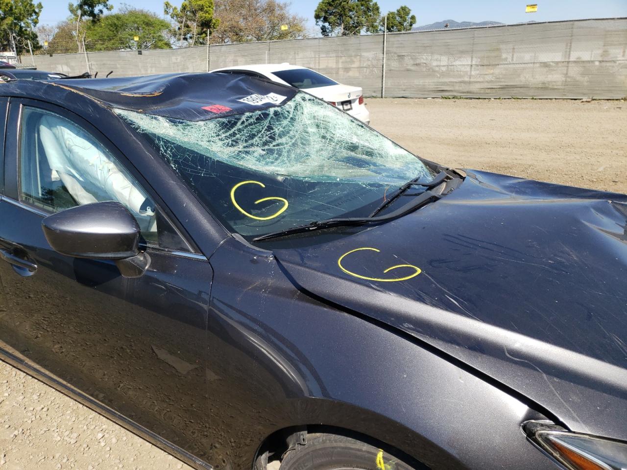 Photo 9 from auction – 2015 MAZDA 3 TOURING with VIN JM1BM1V72F1244003