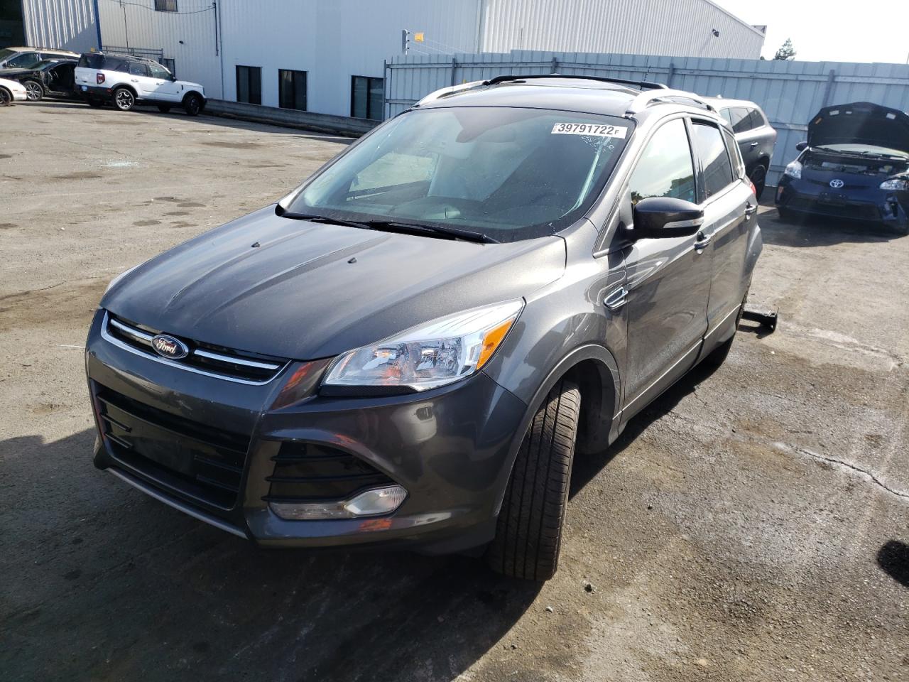 Photo 2 from auction – 2016 FORD ESCAPE TIT with VIN 1FMCU0J98GUA22227