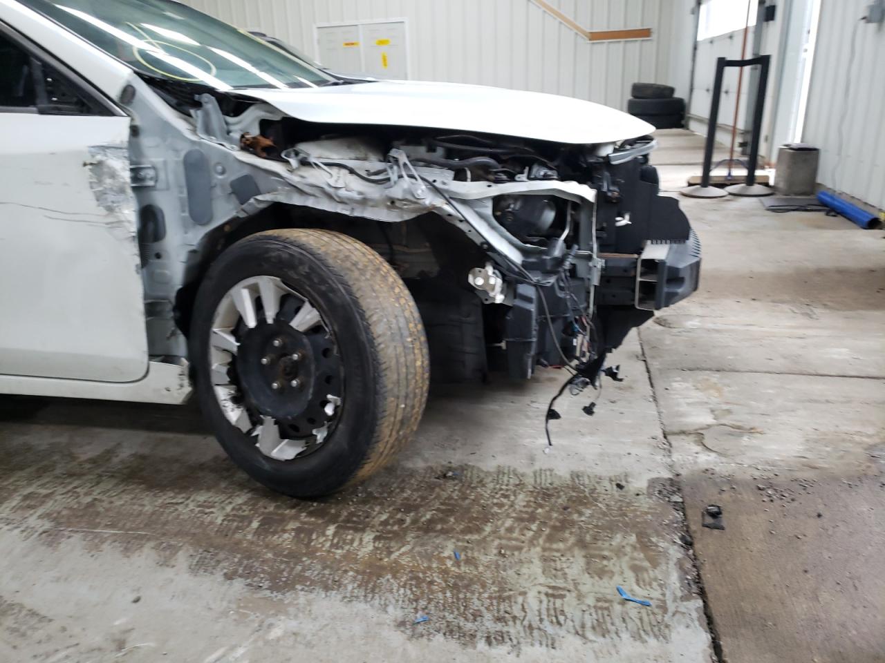 Photo 9 from auction – 2015 NISSAN ALTIMA 2.5 with VIN 1N4AL3AP2FN896490