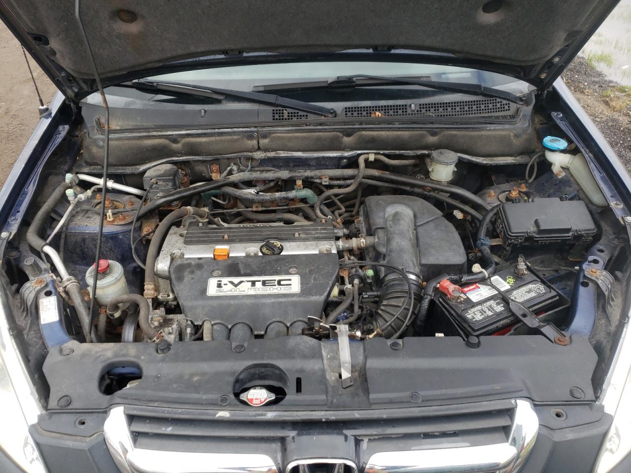 Photo 7 from auction – 2002 HONDA CR-V LX with VIN JHLRD68492C017678