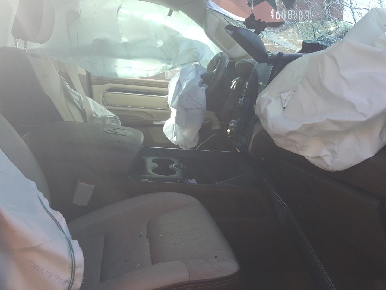 Photo 5 from auction – 2021 RAM 1500 LARAM with VIN 1C6SRFJT8MN636482