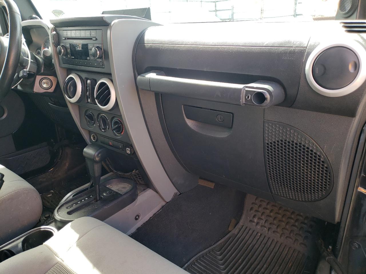 Photo 9 from auction – 2009 JEEP WRANGLER U with VIN 1J8GA59129L731859