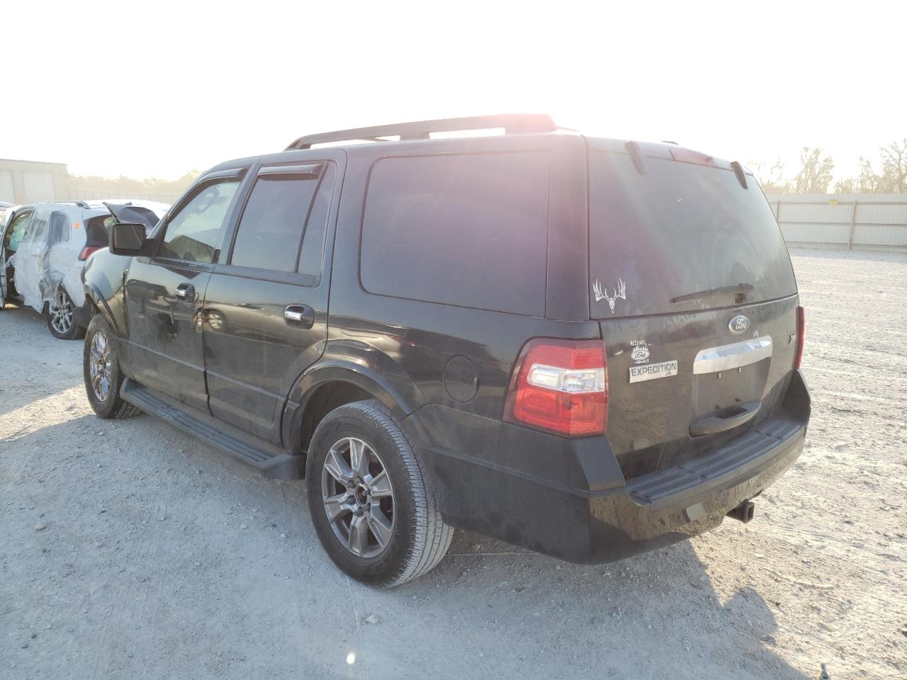 Photo 3 from auction – 2011 FORD EXPEDITION with VIN 1FMJU1H53BEF53581