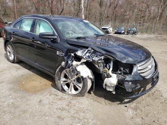 FORD TAURUS SE 2015 with VIN 1FAHP2D98FG176173 - Photo from auction