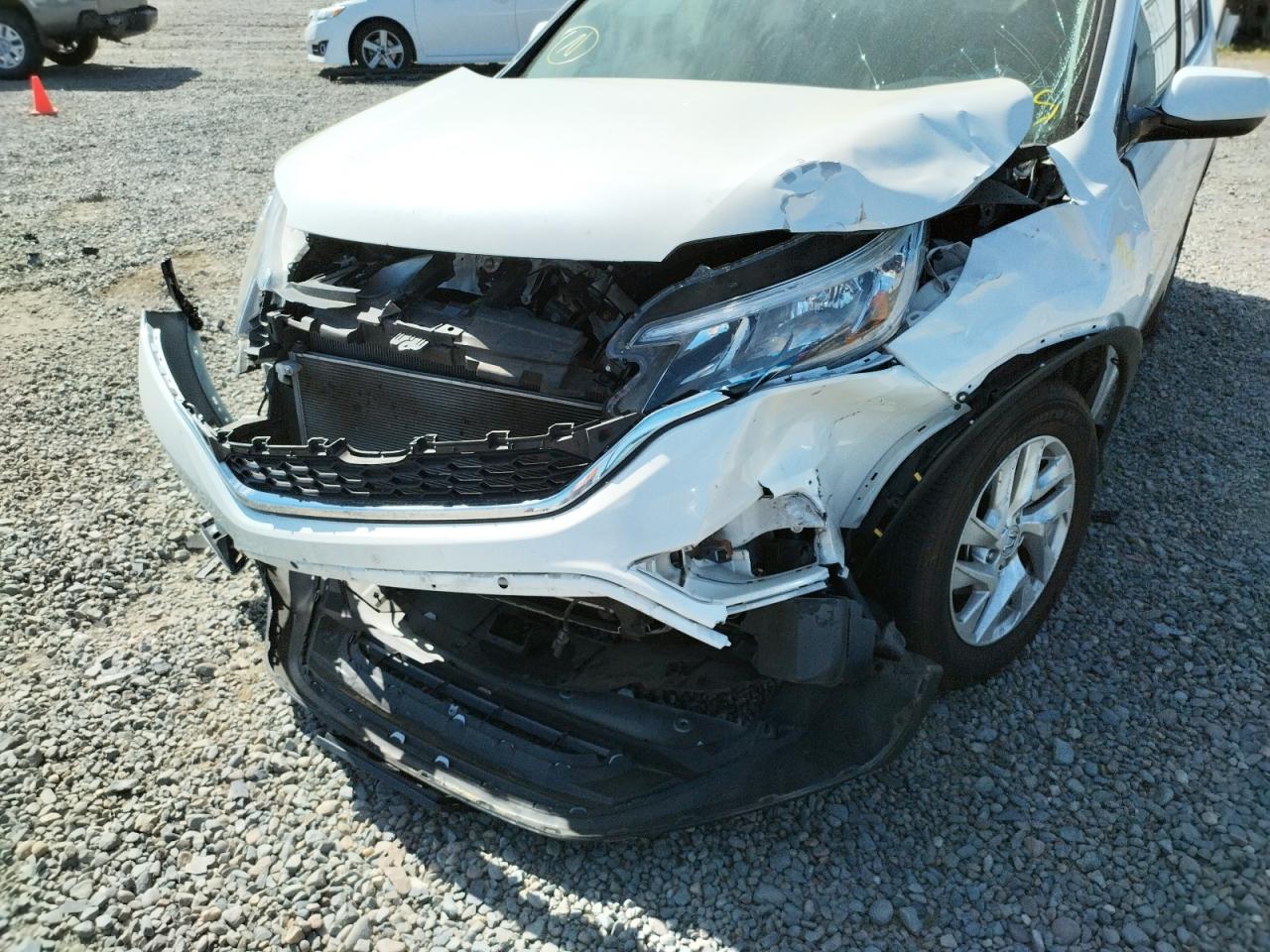 Photo 9 from auction – 2015 HONDA CR-V EXL with VIN 5J6RM3H71FL013968
