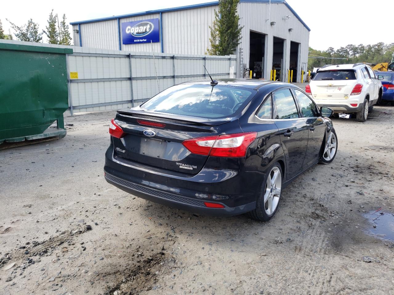Photo 4 from auction – 2014 FORD FOCUS TITA with VIN 1FADP3J22EL141730