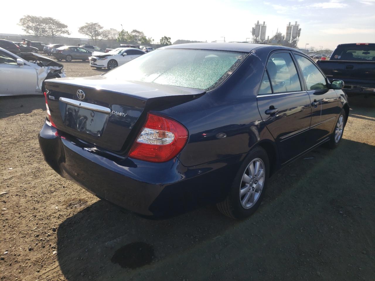 Photo 4 from auction – 2002 TOYOTA CAMRY LE with VIN JTDBE30K620040809