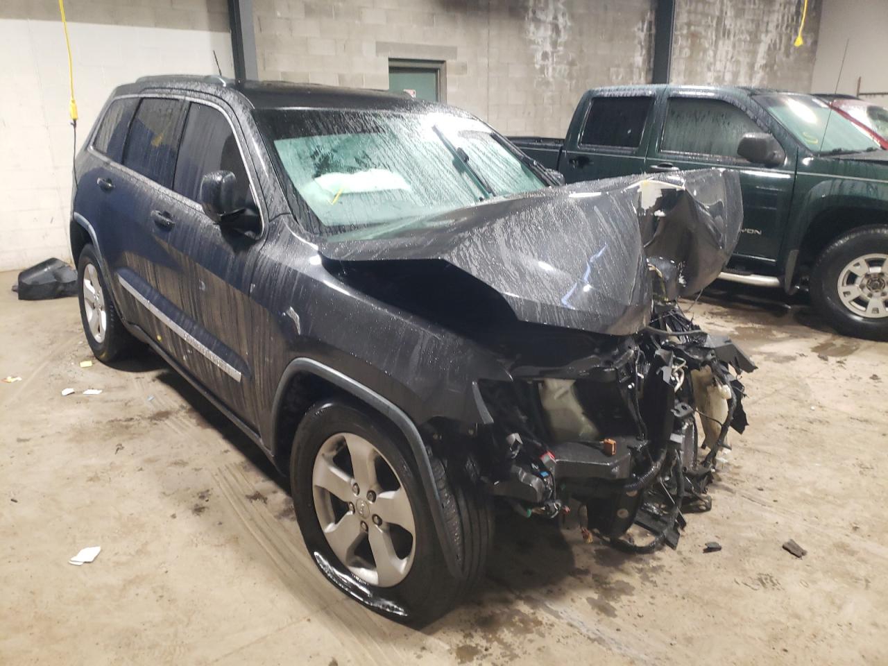JEEP GRAND CHER 2011 with VIN 1J4RR4GG1BC670787 - Photo from auction