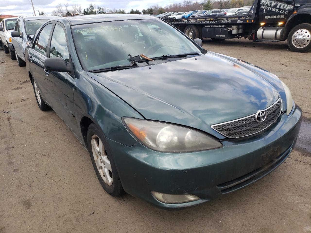 TOYOTA CAMRY LE 2004 with VIN 4T1BE32KX4U263360 - Photo from auction