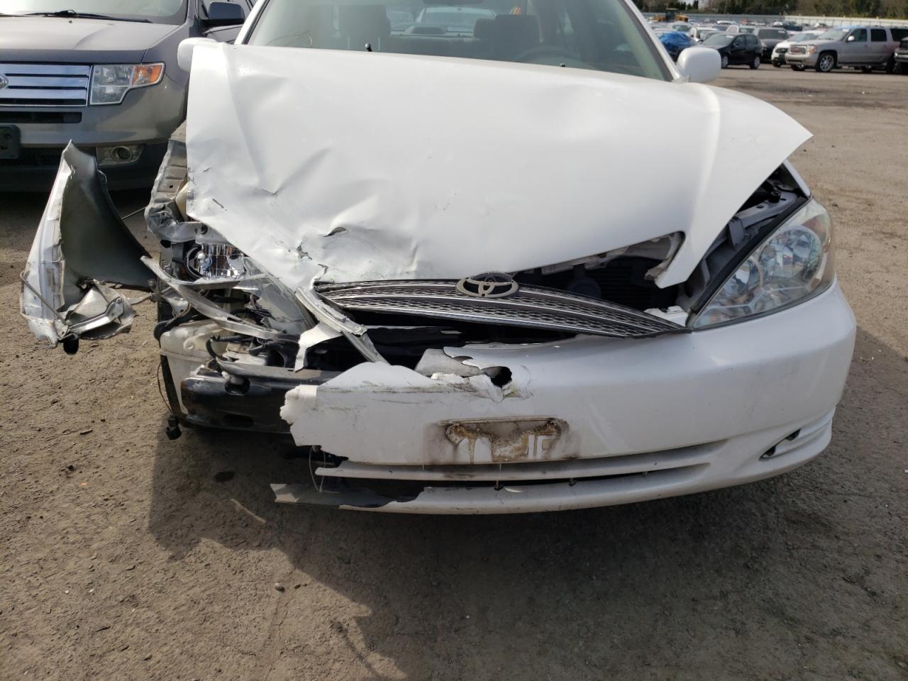 Photo 9 from auction – 2002 TOYOTA CAMRY LE with VIN 4T1BE30K42U560222