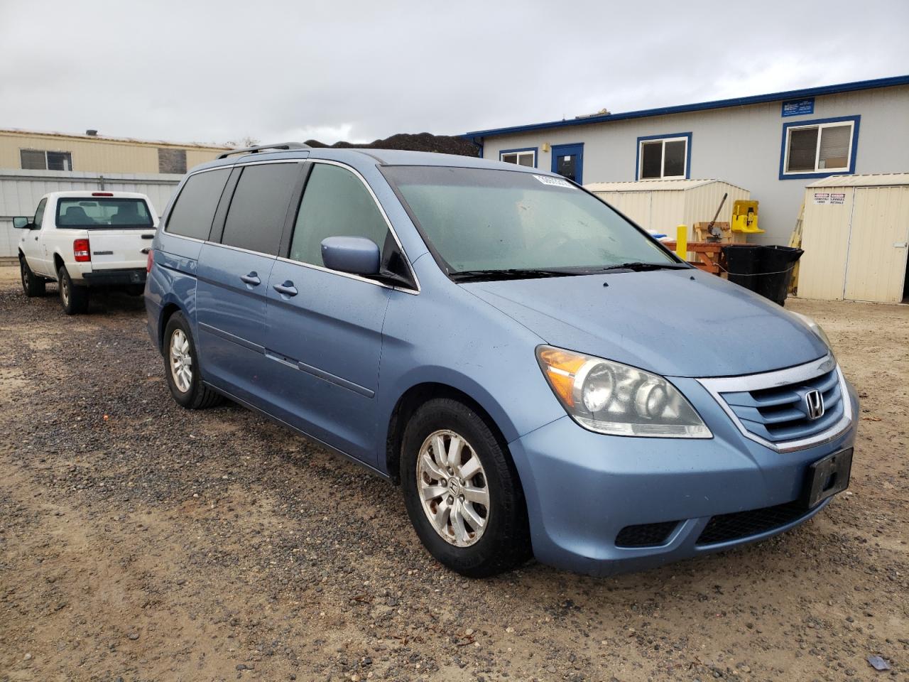 HONDA ODYSSEY EX 2010 with VIN 5FNRL3H4XAB075086 - Photo from auction