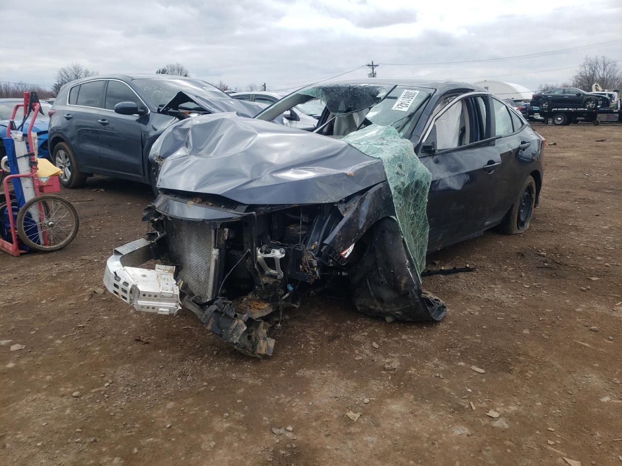 Photo 2 from auction – 2019 HONDA CIVIC LX with VIN 2HGFC2F65KH537651