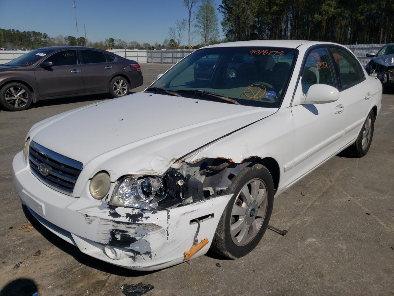 Photo 2 from auction – 2005 KIA OPTIMA LX with VIN KNAGD128155390013