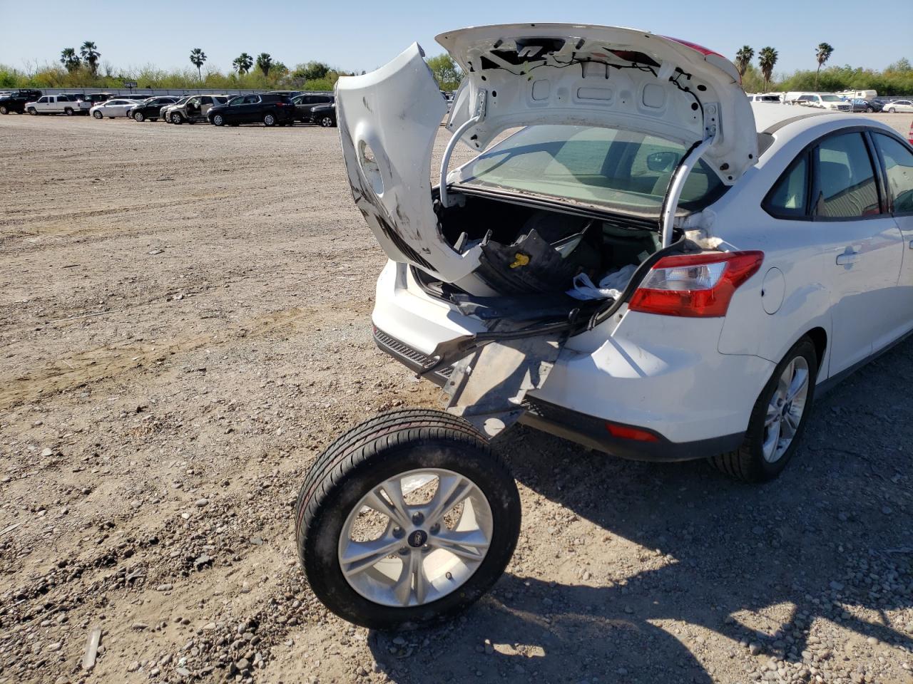 Photo 9 from auction – 2014 FORD FOCUS SE with VIN 1FADP3F24EL451404