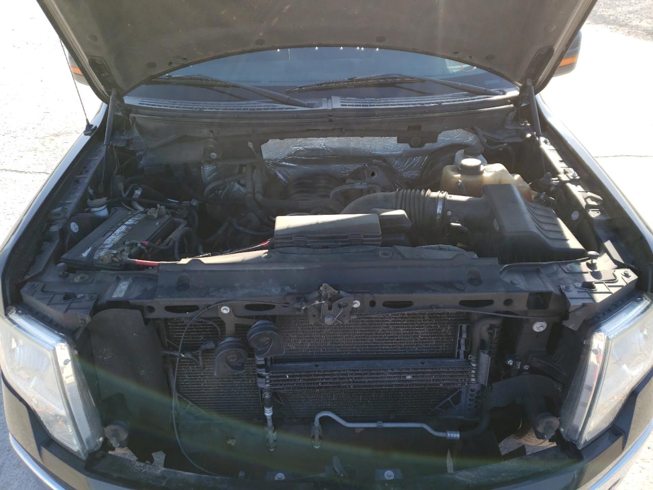 Photo 7 from auction – 2012 FORD F150 SUPER with VIN 1FTFW1CF4CKD98904