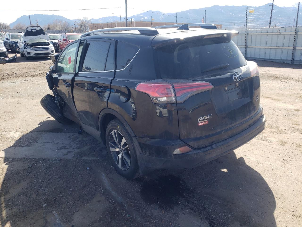 Photo 3 from auction – 2018 TOYOTA RAV4 LE with VIN 2T3BFREV6JW720397